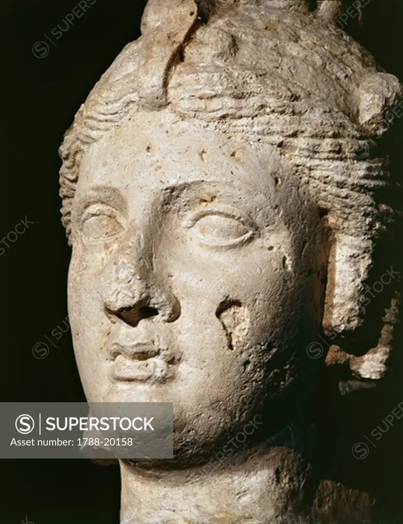 Limestone head of Cleopatra I or II, from Alexandria, Mazarita district (181-164 b.c.)