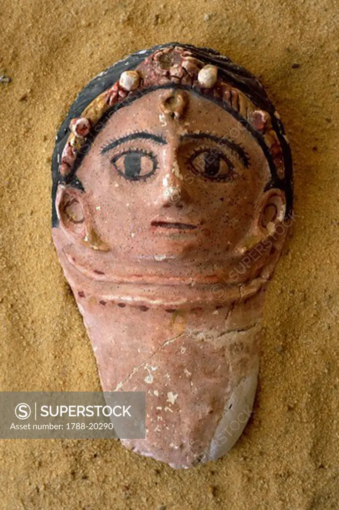 Egypt, Bahariya Oasis, Valley of the Golden Mummies, Terracotta funerary mask