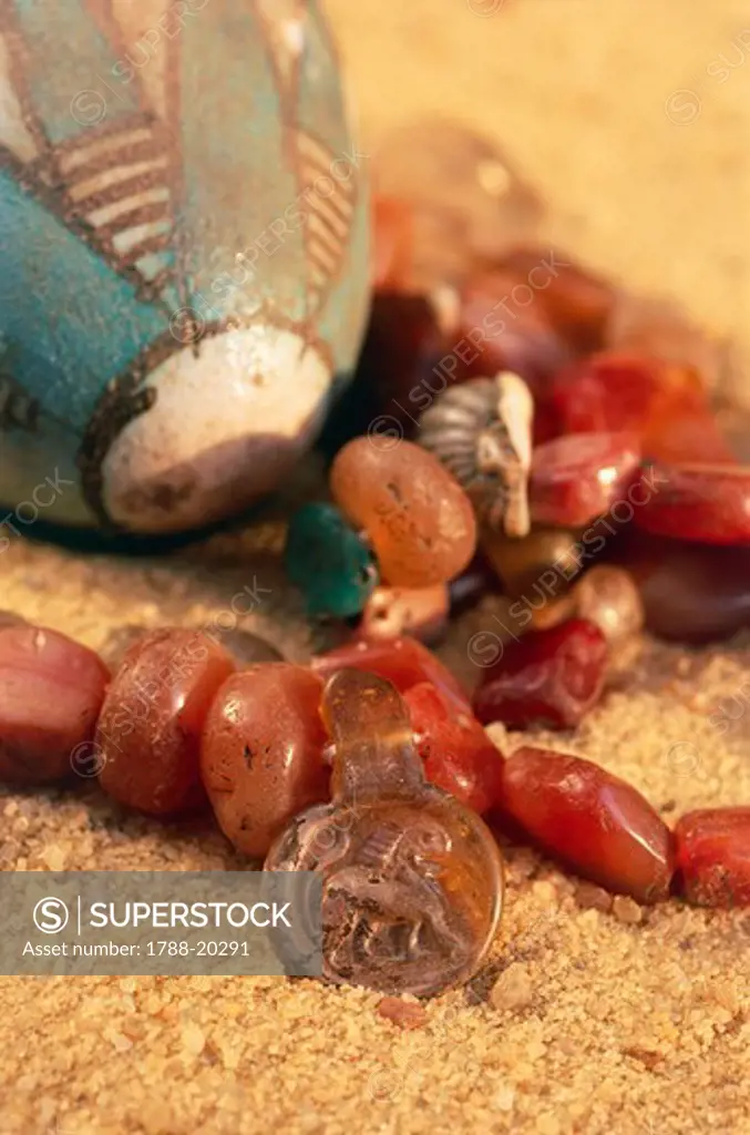 Egypt, Bahariya Oasis, Valley of the Golden Mummies, carnelian necklace and pendant with lion