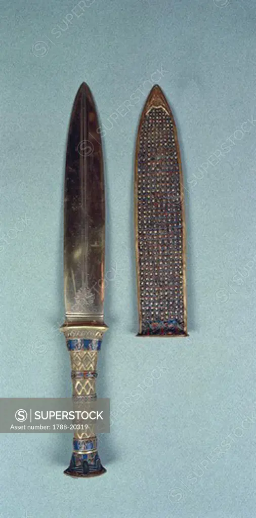 Dagger of the king containing semi-precious stones, with fox's head on top, from Treasure of Tutankhamen