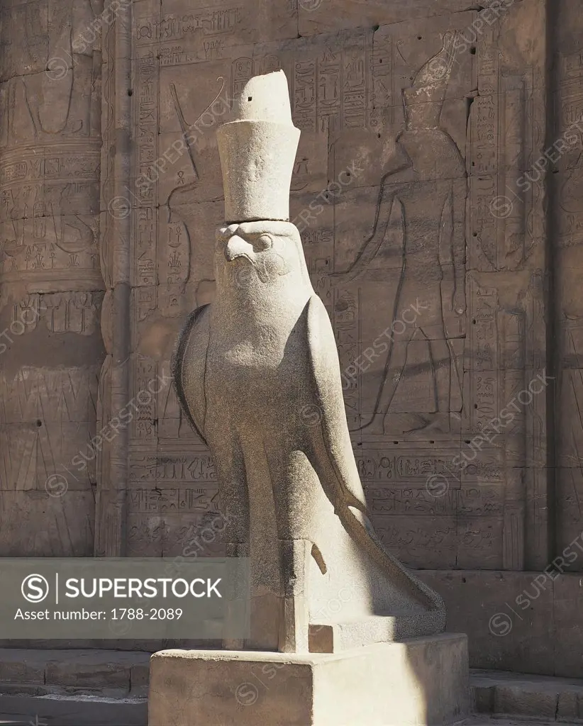 Egypt - Idfu (Edfu). Temple of Horus. Statue of Horus in the form of falcon wearing the double crown of Egypt. Ptolemaic dynasty