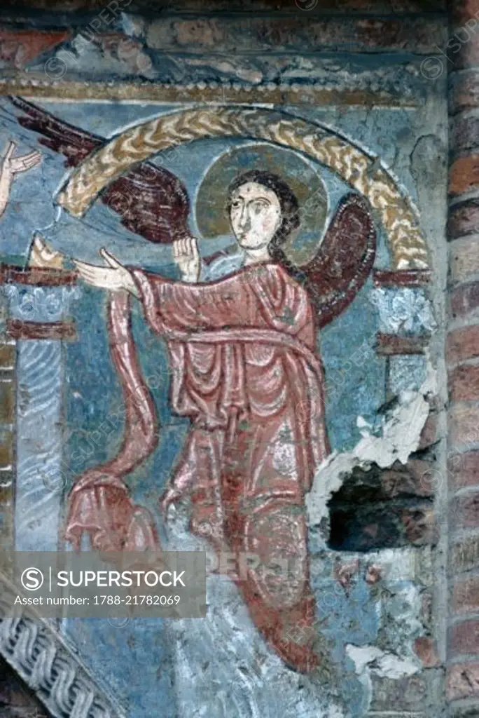 Angel playing trumpet, basilica of Santi Felice and Fortunato, Vicenza, Veneto. Italy, 11th century.