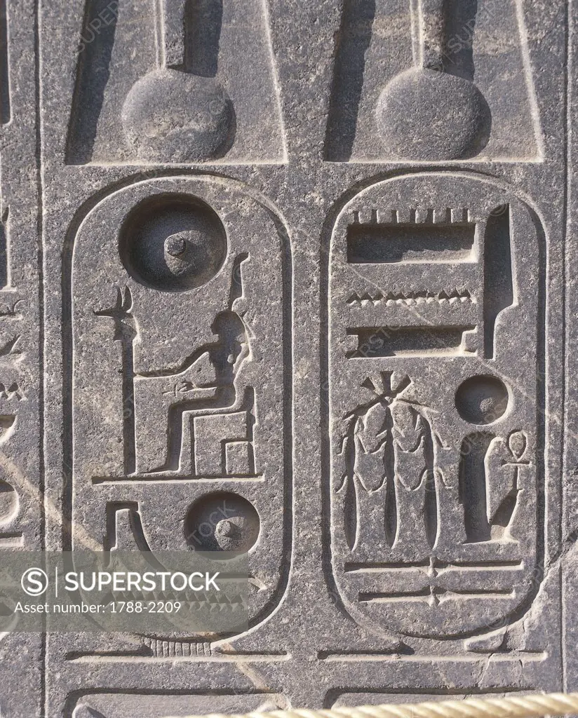 Paleography - Egypt - Ancient Thebes (UNESCO World Heritage List, 1979). Luxor. Temple of Amon. Relief detail of the cartouche of Ramses II (1290-1224 b.C.)