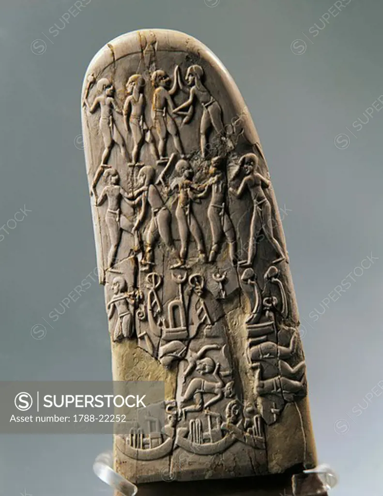 Gebel el-Arak Knife handle, carved with land battle and sea battle scenes, late Predynastic period