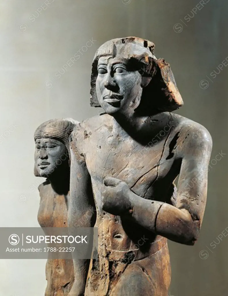 Egypt, Sculpture representing the civil servant Menfita with his wife, wood