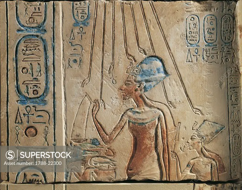 Egypt, Tell el-Amarna, Bas-relief depicting Amenhotep IV (Pharaoh Akhenaten, circa 1360 - 1342) and his wife Nefertiti (circa 1370-1330 BC) worshiping the solar disc, eighteenth dynasty, New Kingdom