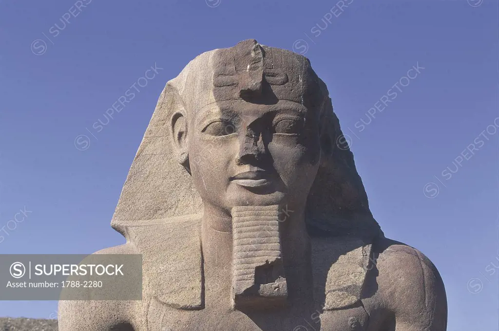 Egypt. Ancient Tanis (San al-Hajar al-Qibliyah). Temple of Amon. Statue of Ramses II, detail.