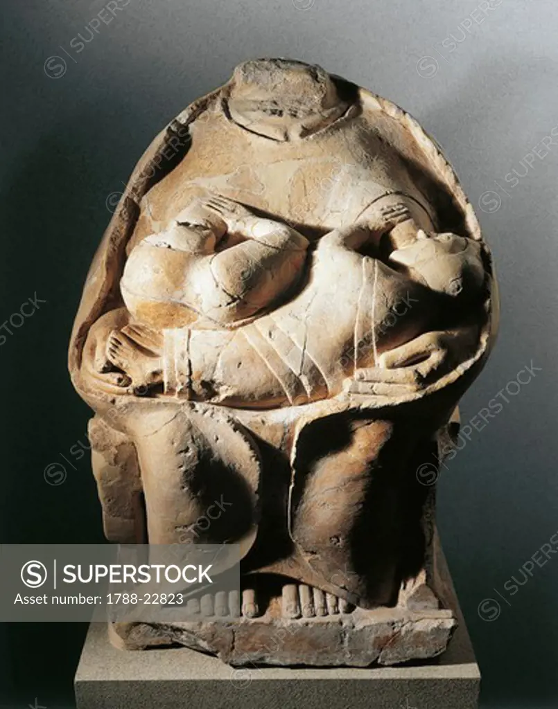 Italy, Sicily, Statue of a breast-feeding Goddess from the Temple of Megara Hyblaea