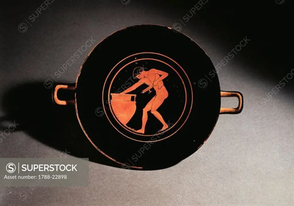 Greece, Athens, Red-figure kylix depicting a young man taking wine from a krater