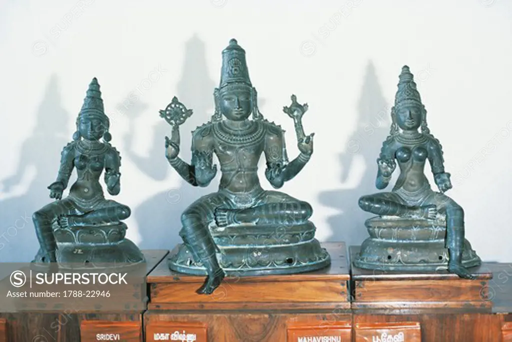 Sculptures representing God Vishnu with his two wives, Indian art