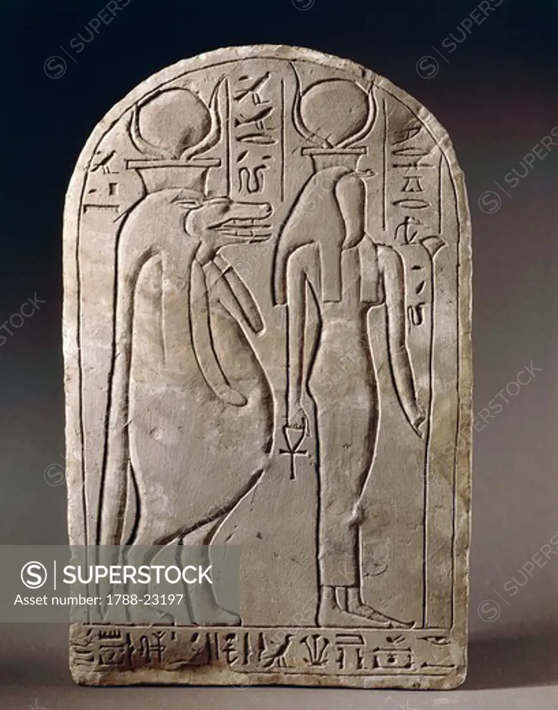Carved stele representing the goddess Meretseger, with female body and snake head, followed by goddess Taweret, twentieth dynasty, limestone