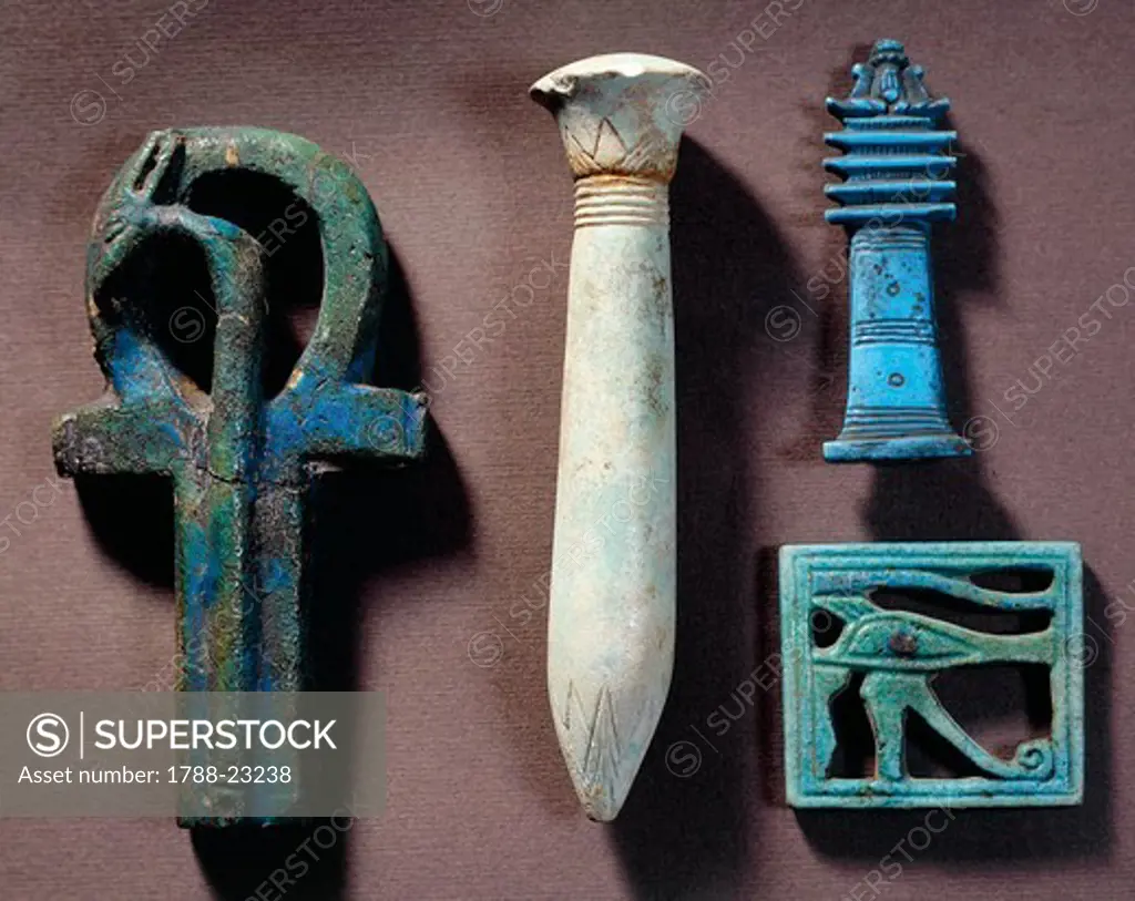 Ankh (crux ansata or key of life), symbol of eternal life, Djed pillar (papyrus-shaped column) symbol of the backbone of the God Osiris, udjat-eye (eye of Horus), symbol of the regeneration