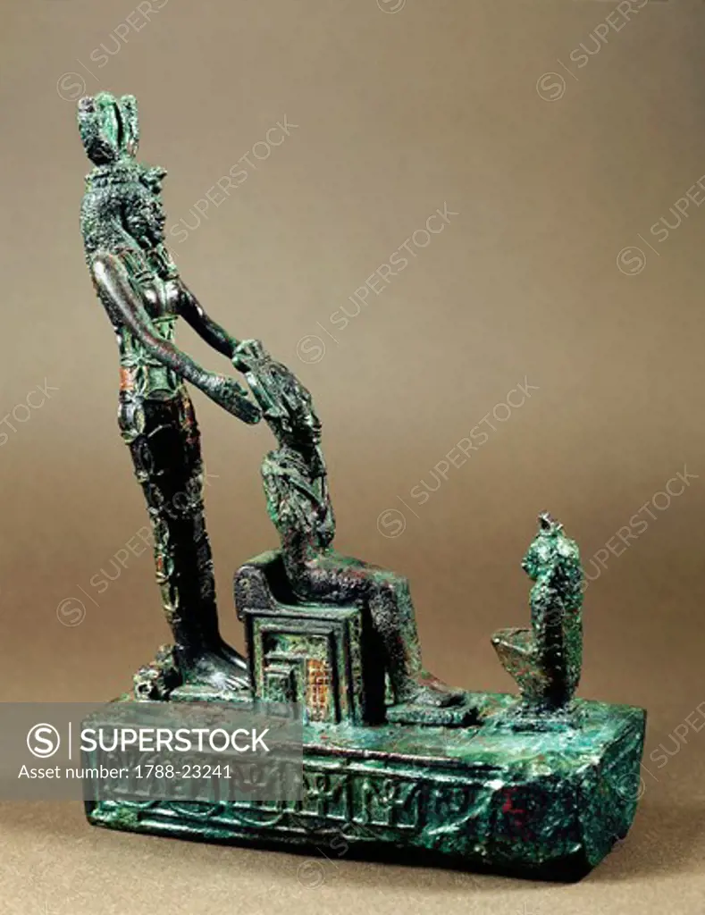 Statuary group representing the Sacred Triad of Osiris, twenty-second-twenty-third dynasty, third intermediate period, bronze