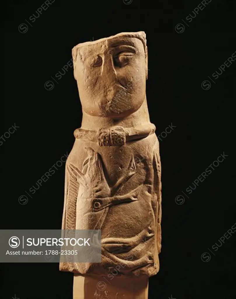 France, Euffigneix, Sculpture representing a God wearing a torque and holding a wild boar