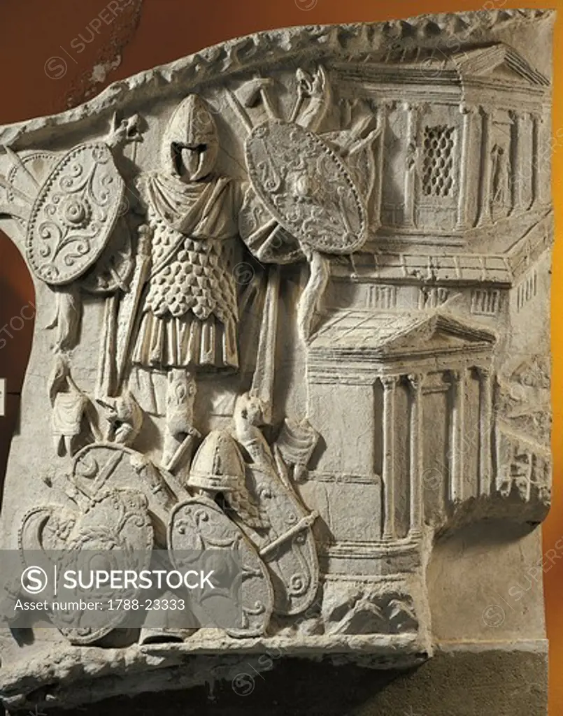 Five Good Emperors, Relief depicting the trophy of Dacian weapons: shields, helmets and battle-axes, plaster cast from the Trajan's Column, 113 A.D., imperial age