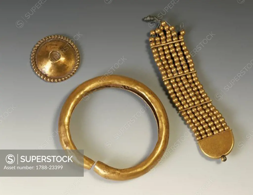 Six strand gold bead bracelet, ring bracelet gilded in gold leaf and gold button or earring, late Mohenjo-daro period