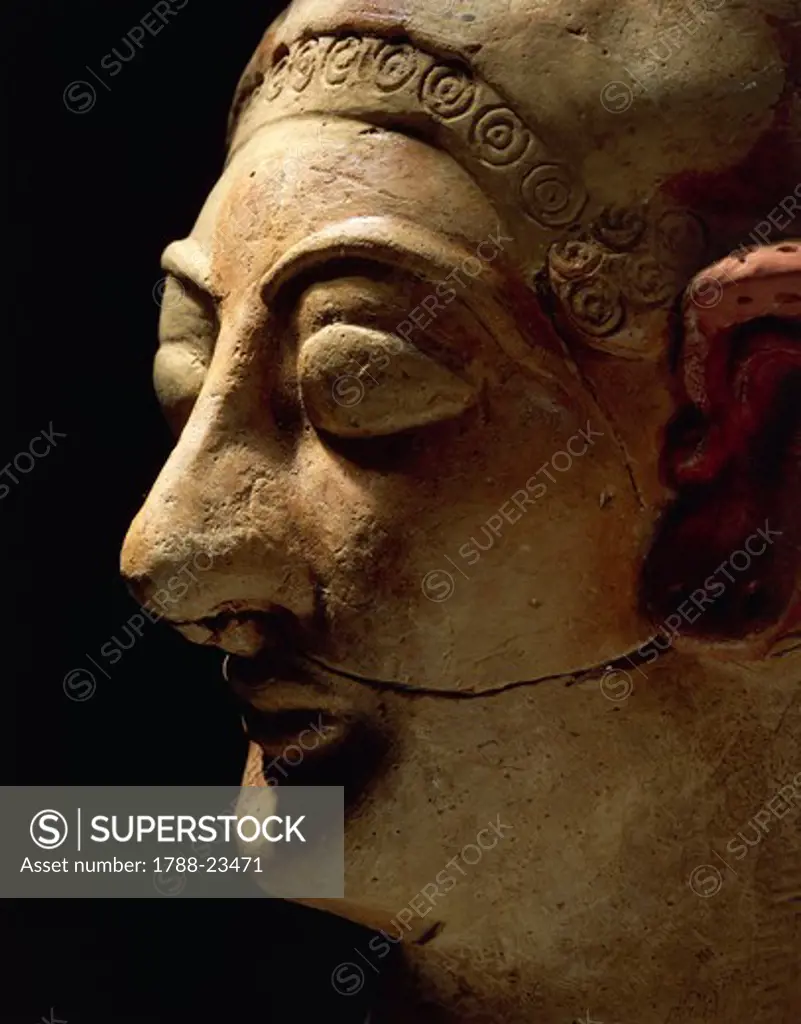 Spain, Ibiza, Detail of female head, terracotta