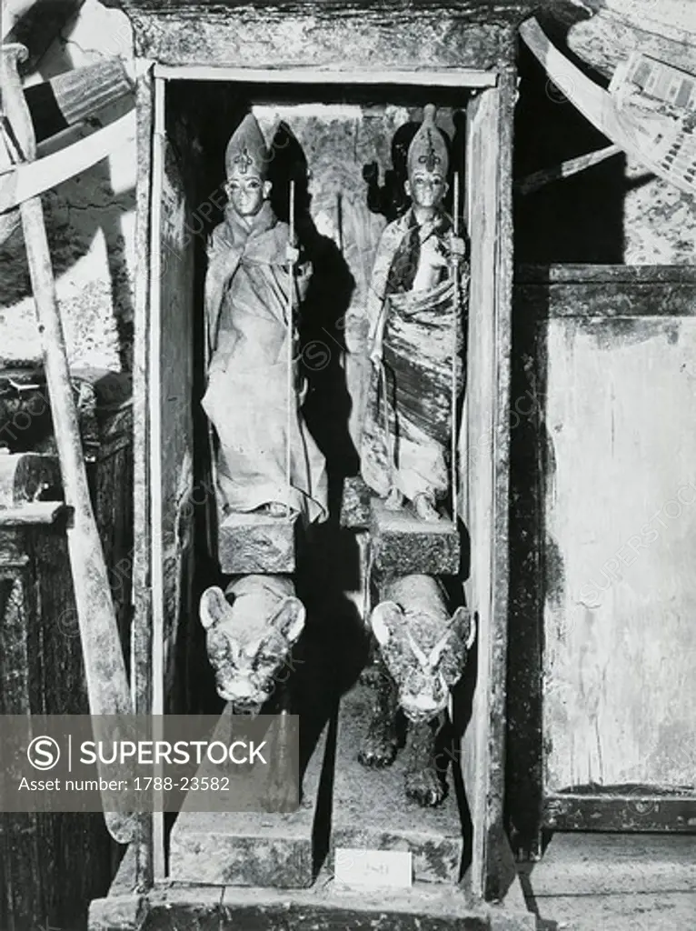 Egypt, Valley of the Kings, The discovery of the tomb of Pharaoh Tutankhamun (or Tutankhamen, circa 1340-1323 B.C.), ritual statuettes in their cases, 1922, vintage photograph