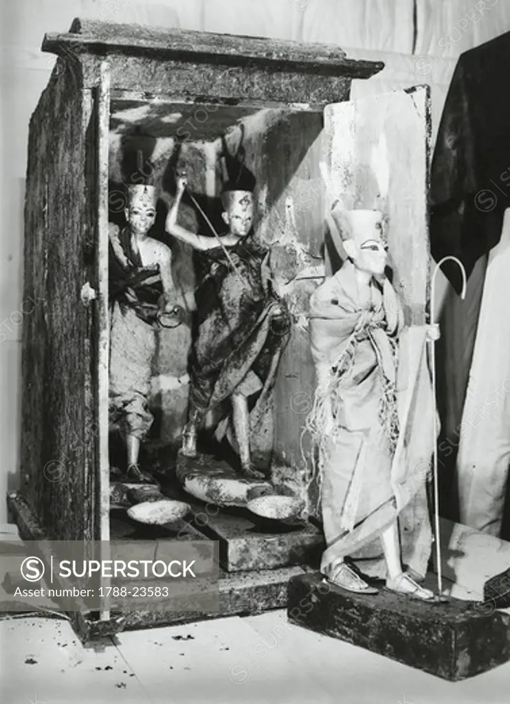 Egypt, Valley of the Kings, The discovery of the tomb of Pharaoh Tutankhamun (or Tutankhamen, circa 1340-1323 B.C.), ritual statuettes in their cases, 1922, Vintage photograph