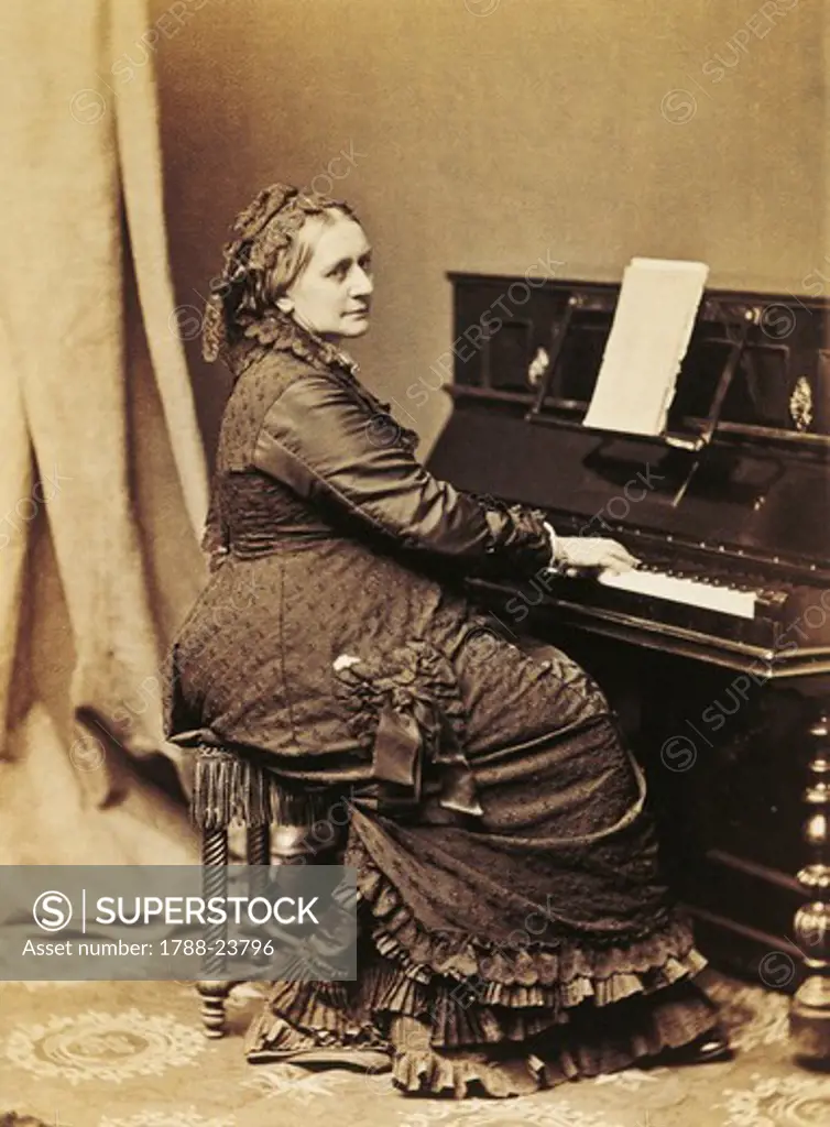 Germany, photographic portrait of German pianist and composer, Clara Schumann at piano