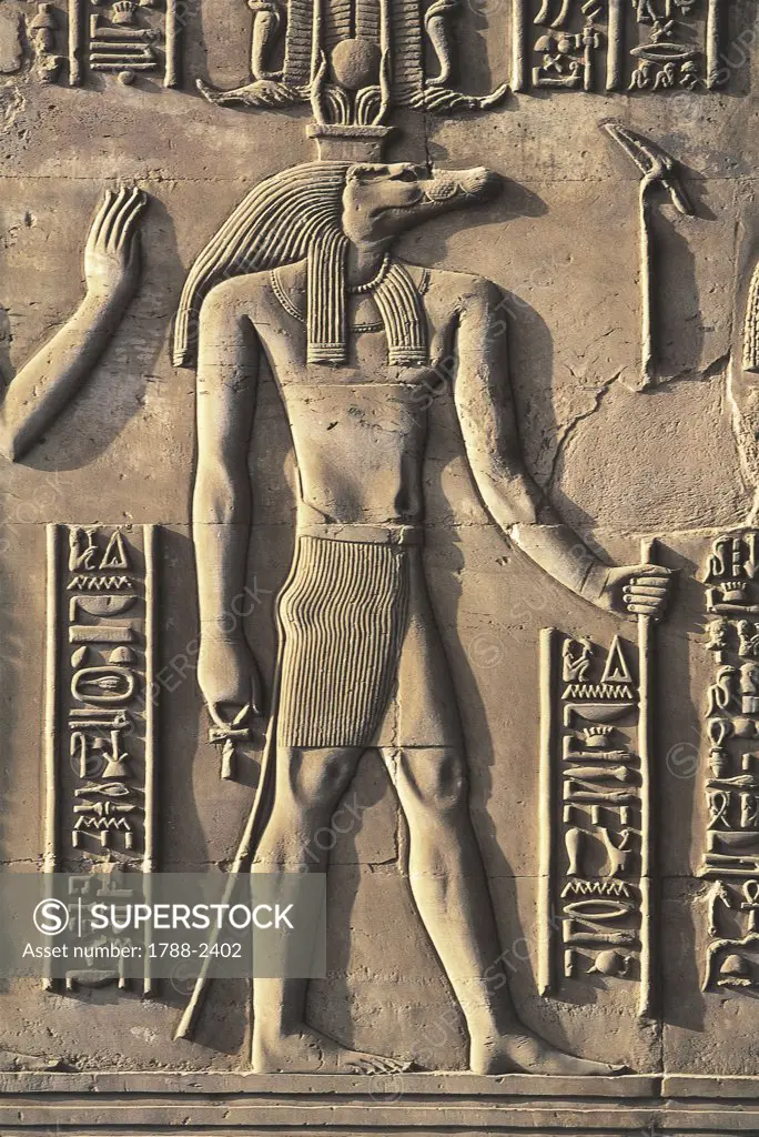 Paleography - Egypt - Kom Ombo -  Ancient Ombos. Temple of Sebek and Haroeris. Relief of God Sebek, a humanoid reptile with the head of a crocodile.