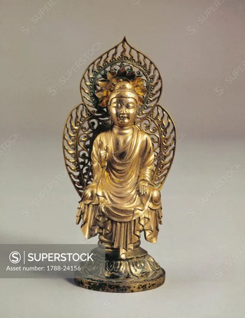 Golden statue of seated Buddha