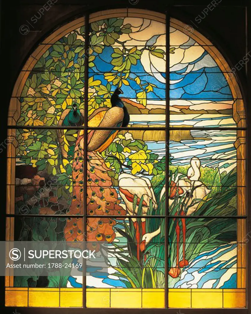 Stained glass window depicting peacocks by Henri Carot (1850-1919)