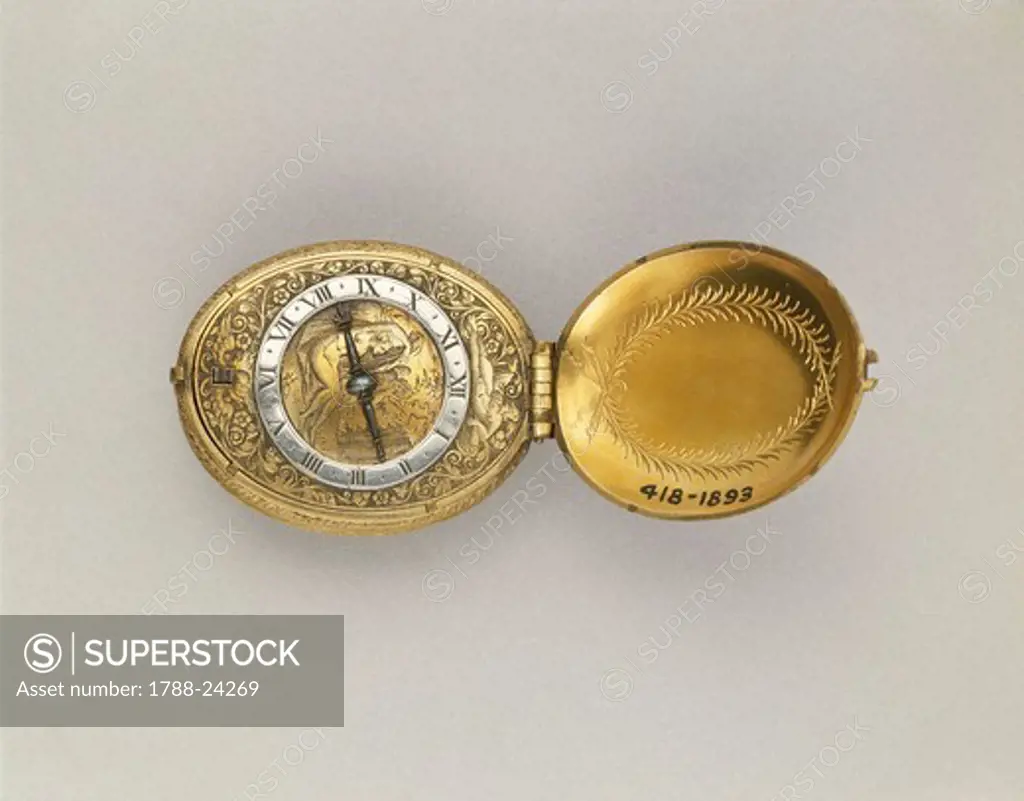 Gilded brass oval clock
