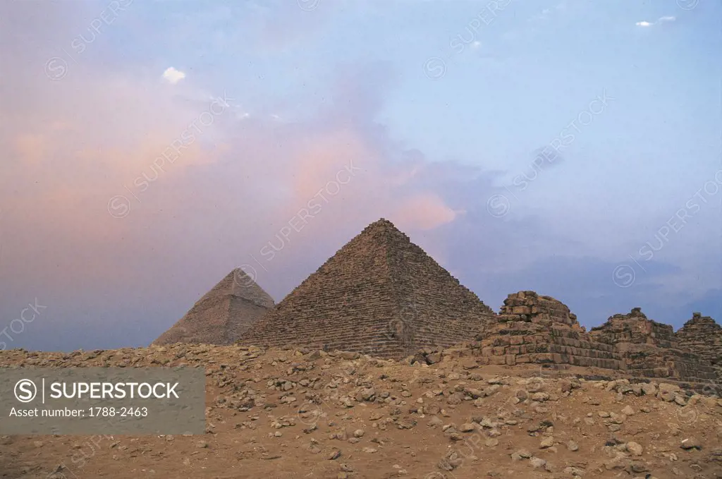 Egypt - Cairo - Ancient Memphis (UNESCO World Heritage List, 1979). Pyramids at Giza. Sunset