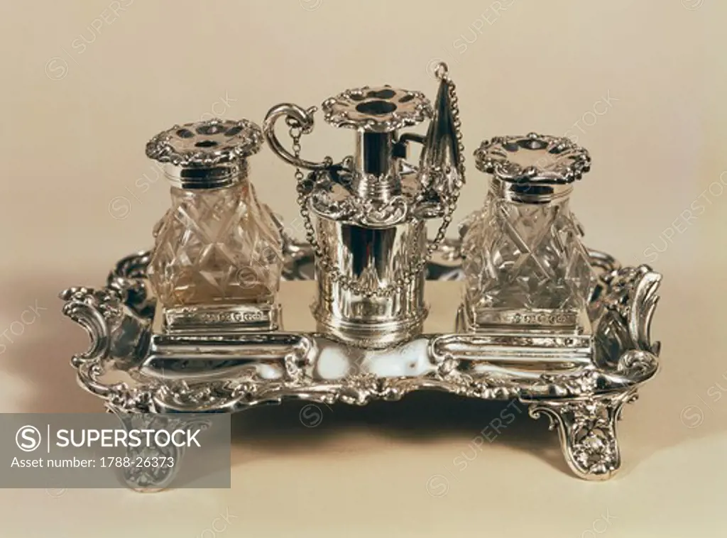Silversmith's Art, Great Britain 19th century. Silver desk-set with inkpots and silver and crystal powder holder.
