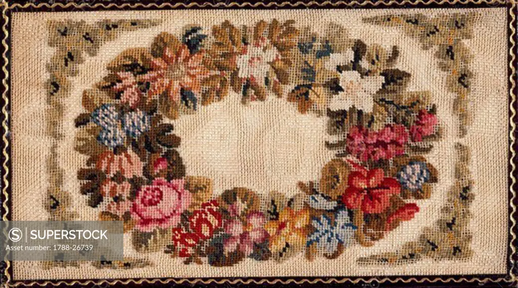 Embroidery, Germany 19th century. Front cover of a notebook, embroidered in woollen small stitch with silk threads on a canvas, with floral motif and leather-binding, approximately  1830.