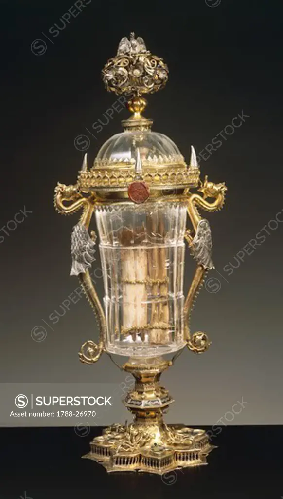 Silversmith's art, Italy, 15th century. Enamelled gilded silver mounted rock crystal glass with lid. Height cm. 44.4.