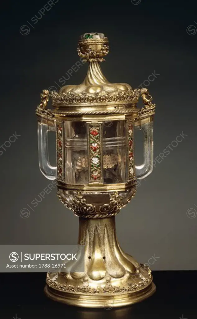 Silversmith's art, Italy, 15th century. Francesco D'Antonio (active 1440-1480), cylindrical rock crystal vase with two handles and with enamelled and gilded silver mount. Height cm. 32.5.