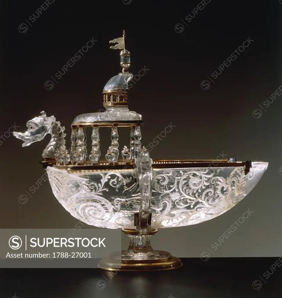 Goldsmith's art, Italy, 16th century. Galley-shaped rock crystal table fountain with gold bands set with garnets. Height cm. 12.4. Saracchi Workshop manufacture.