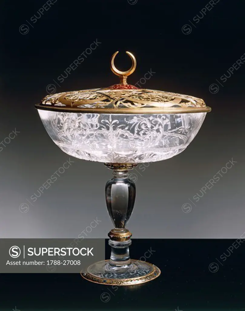Goldsmith's art, Italy, 16th century. Gasparo Miseroni (active about 1550-1575), Cup in rock crystal and enamelled gold. Height 22.5 cm. Openwork gold lid.