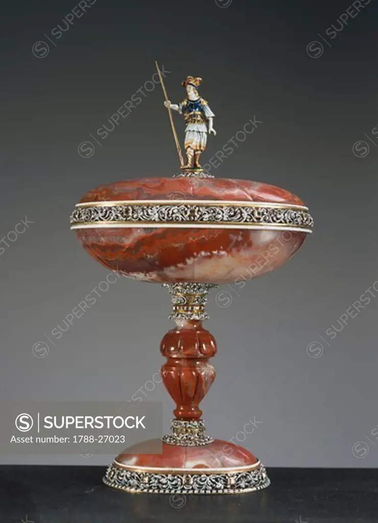 Goldsmith's art, Germany, 17th century. Carved agate vase with lid and enamelled silver-gilt mount set with diamonds, height cm. 21.