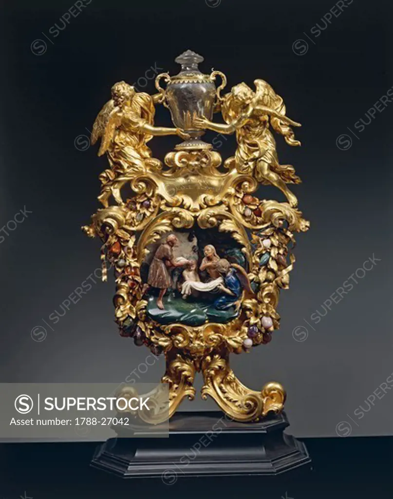 Goldsmith's art, Italy, 18th century. Reliquary of Saint Mary of Egypt in gilded bronze, ebony and pietre dure, 1704. Height cm. 68.
