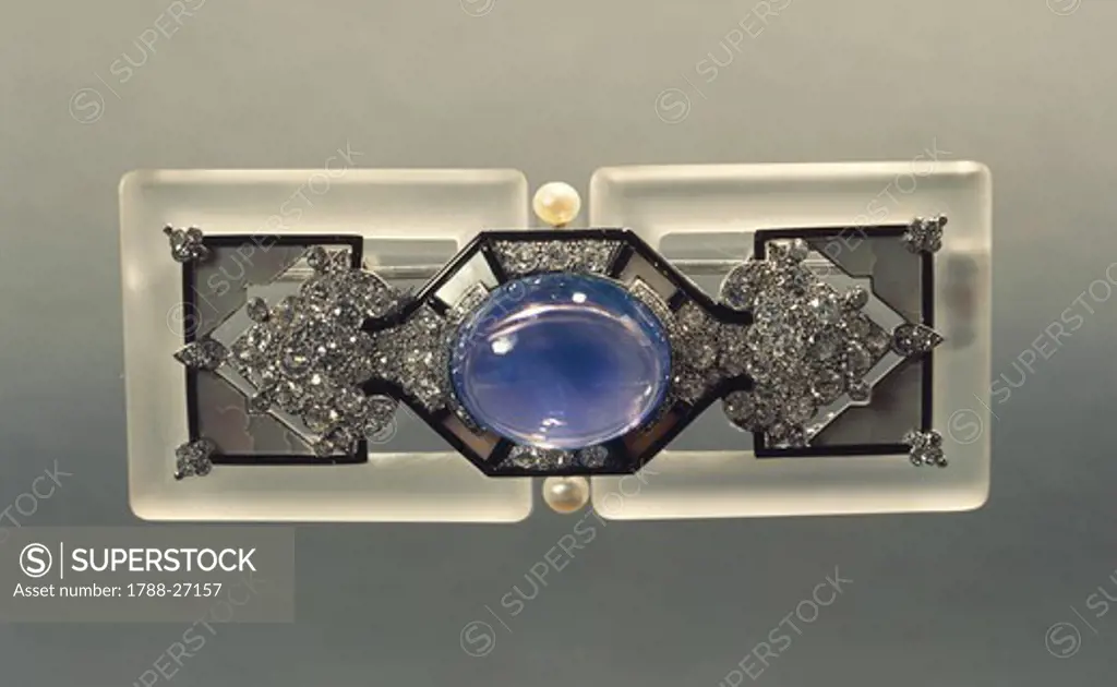 Goldsmith's art, France, 20th century. Rock crystal, mother-of-pearl and cabochon cut sapphire rectangular brooch.