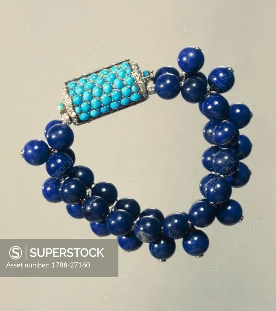 Goldsmith's art, France, 20th century. Three rows of lapis lazuli beads bracelet with turquoises and diamonds clasp, Cartier 1937.