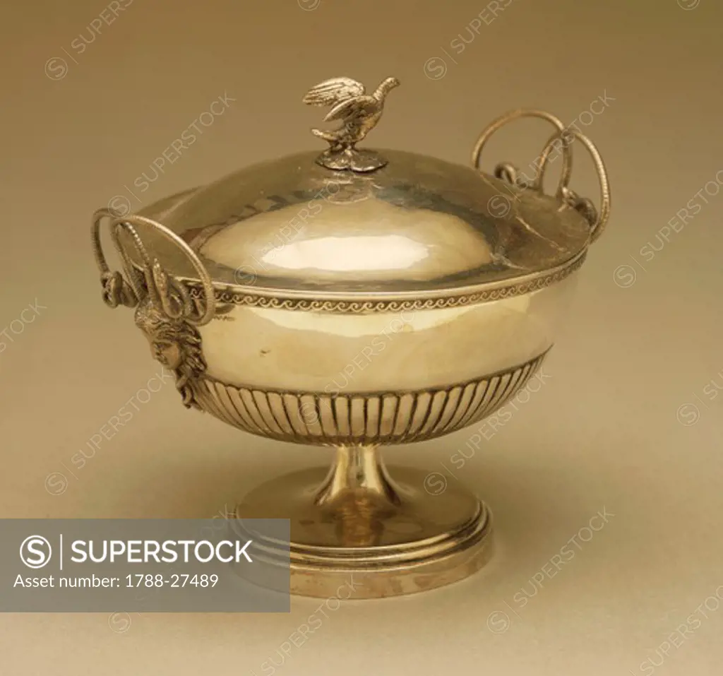 Silversmith's Art, 19th century. Silver tureen with snake-shaped handles, pheasant-shaped cover and head of Medusa-shaped decorations.