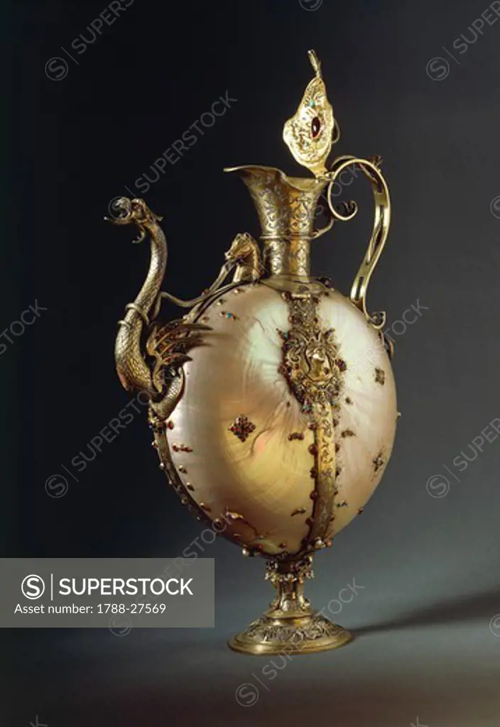 Silversmith's art, Flanders, 16th century. Silver gilt mounted ewer with a double nautilus, set with rubies and turquoises, height cm. 30