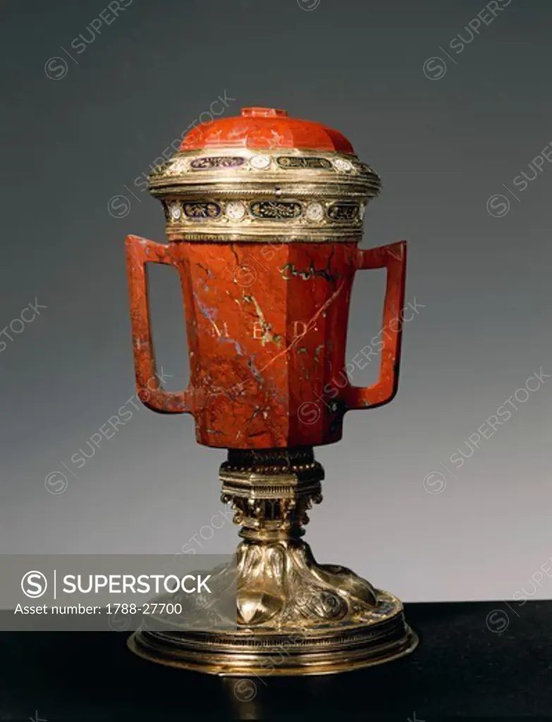 Silversmith's art, Italy, 15th century. Jasper, enamelled gilded silver vase with two handles and lid. Height cm. 27. Signed LAV.R.MED.
