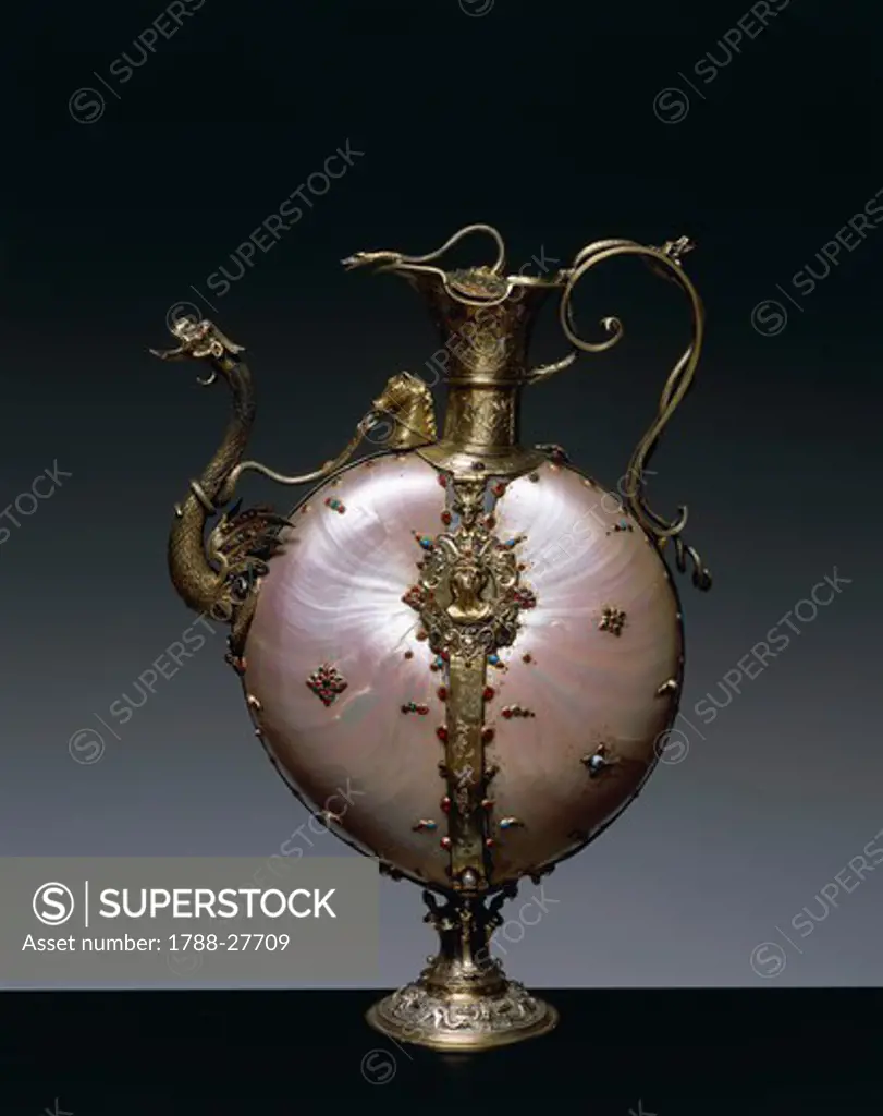 Silversmith's art, Flanders, 16th century. Silver gilt mounted ewer with a double nautilus, set with rubies and turquoises, height cm. 30