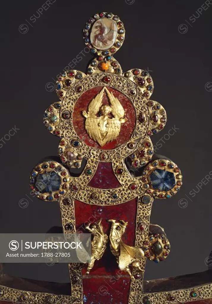 Goldsmith's art, 13th century. Processional cross in red jasper, gold and gems. Donated by Otto Visconti to Abbot Paolo da Besana, 1296. Front side. Detail: Angels.