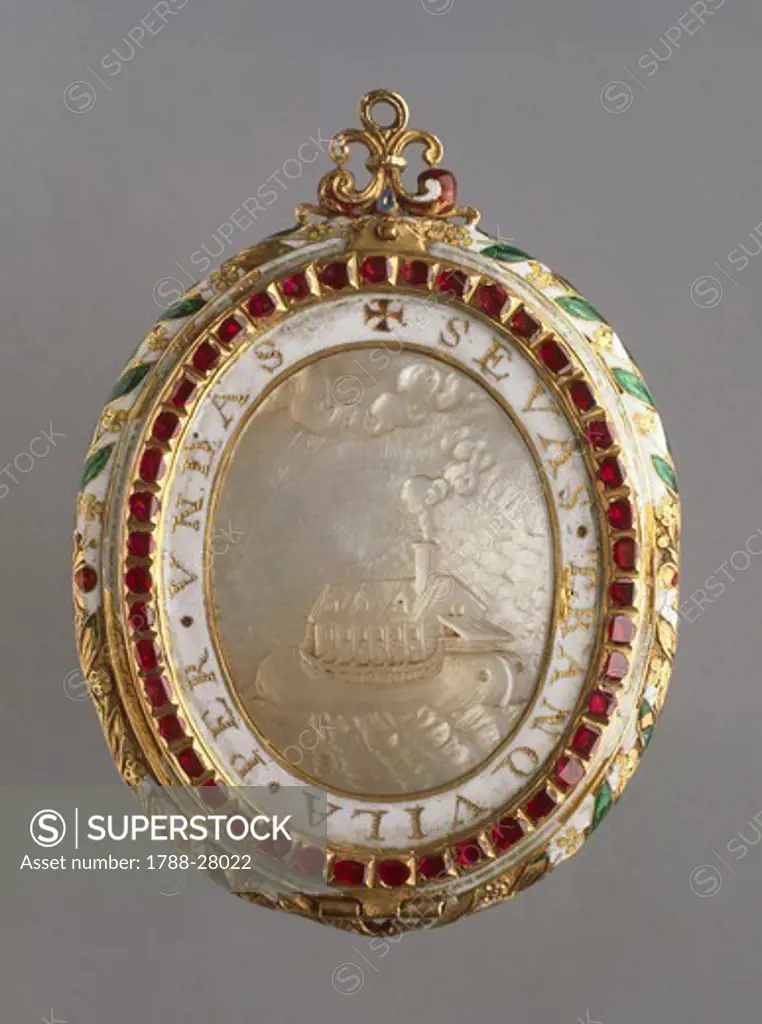Goldsmith's art, England, 16th century. Gold, mother-of-pearl, rubies and emeralds pendant of the Spanish Armada, 1580-1600, mm. 60x22. Side depicting Noah's ark and bearing inscription ""sevas tranquila per undas"" (calm between the waves).