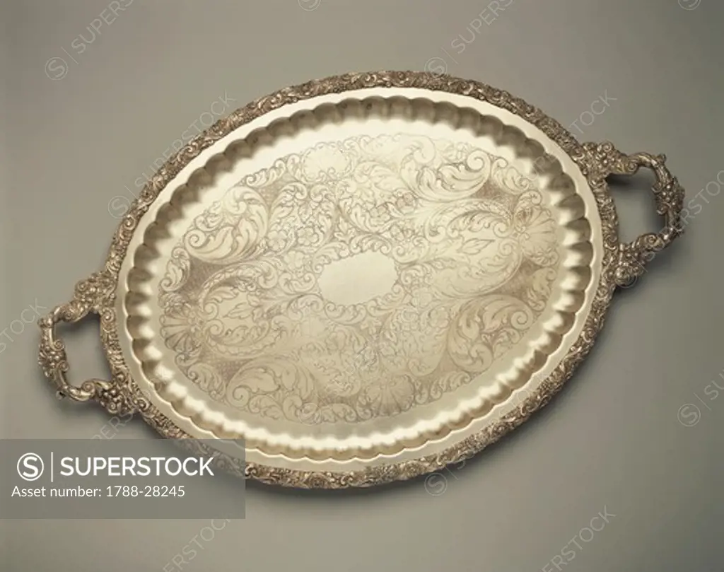 Silversmith's Art, England 20th century. Sheffield plate tray with engraved surface, embossed border and handles with floreal motifs, approximately 1900's.