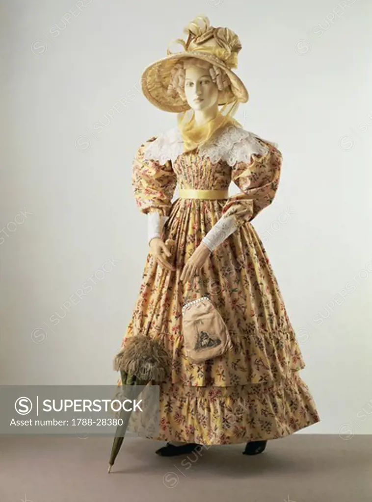 Fashion, England, 19th century. Women's dress with printed patterns, complete with hat, handbag and parasol.