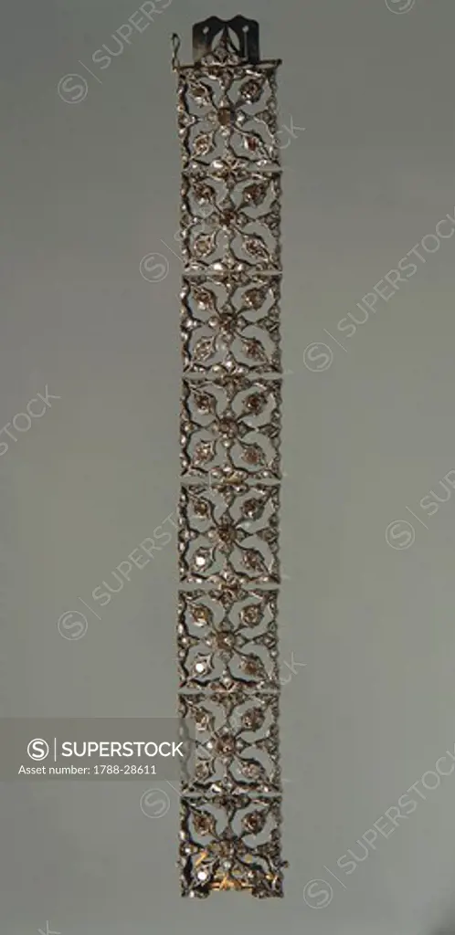 Goldsmith's art, Italy, 20th century. Mario Buccellati, openwork gold and silver band bracelet set with rose-cut diamonds, 1920s.