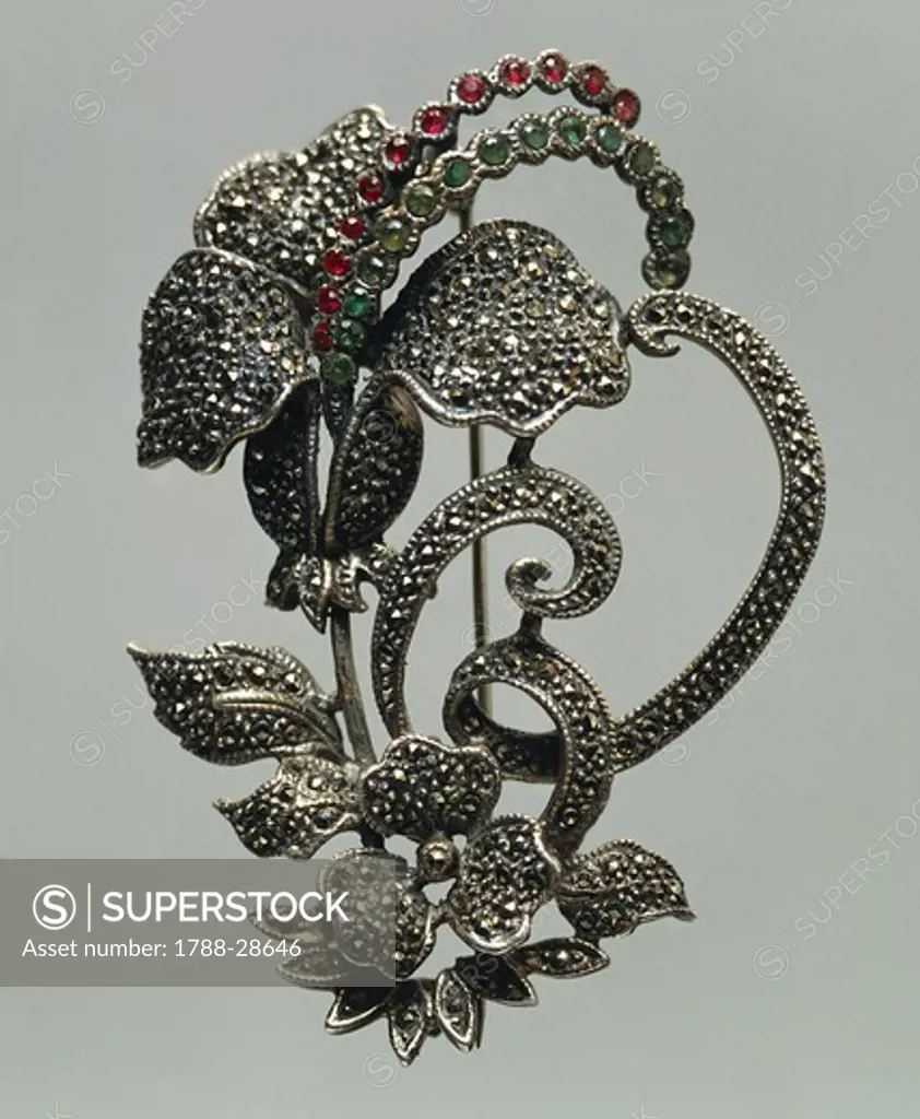 Silversmith's art, Italy, 20th century. Bouquet-shaped silver brooch set with diamonds, rubies and emeralds, 1950s.