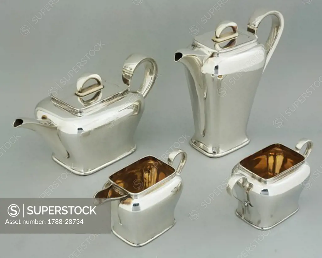 Silversmith's Art, England 20th century. Tea and coffee set: pair of silver teapots and coffeepots, 1947. Design by Roberts and Belk.